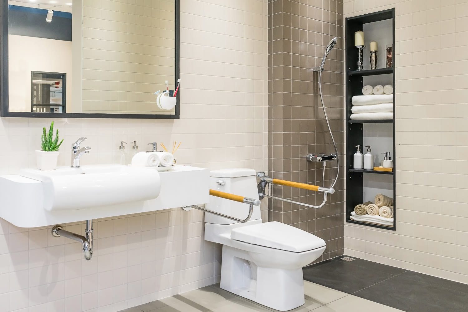 Barrier-free roll-in shower with grab bars
