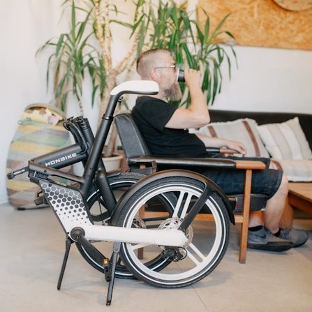 An older adult walking with a walker at home